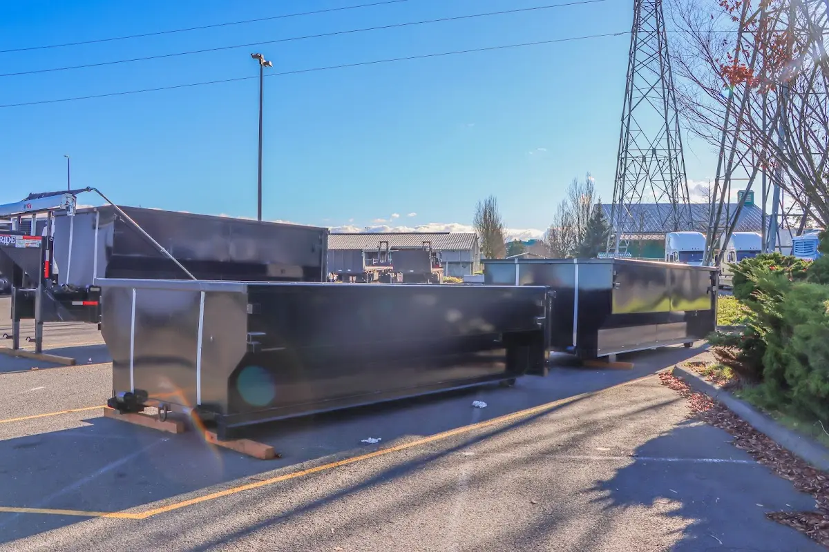 Roll-off dumpster ready for waste disposal at job site for Residential Dumpster Rental in Lyon